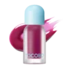 Tocobo Juicy Berry Plumping Lip Oil tono Berry Brandy 02 con fondo de textura frutal.