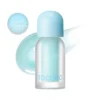 Tocobo Juicy Berry Plumping Lip Oil tono Frozen Berry con fondo de textura frutal.