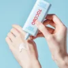 Textura ligera y acuosa del Tocobo Bio Watery Sun Cream SPF 50+ PA++++ sobre la piel.
